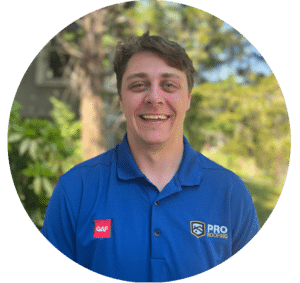 a headshot image of Jackson Casey, a ProRoofing team member in Alabama, dressed in a blue polo