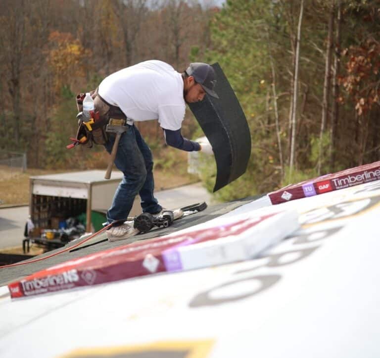 a ProRoofing professional in Asheville working on emergency roof repair