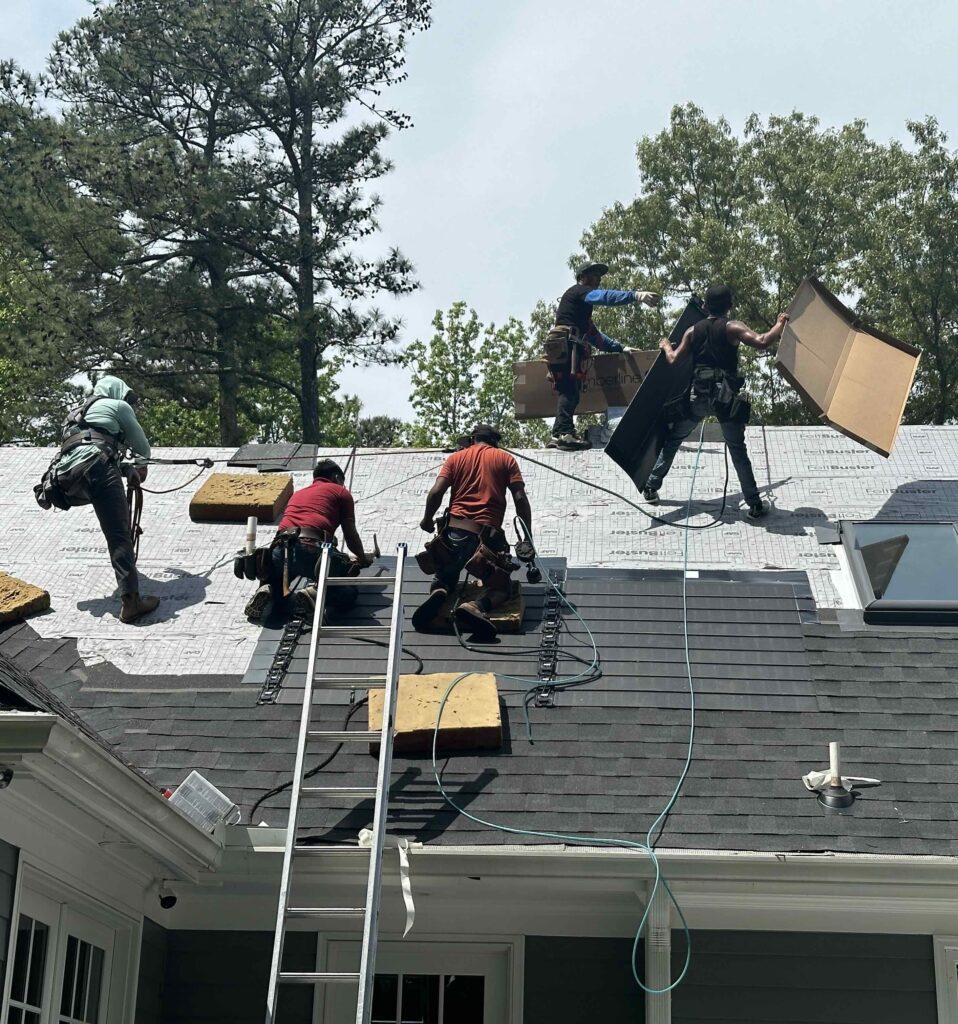 an image of the ProRoofing roof team repairing a roof in Atlanta Georgia